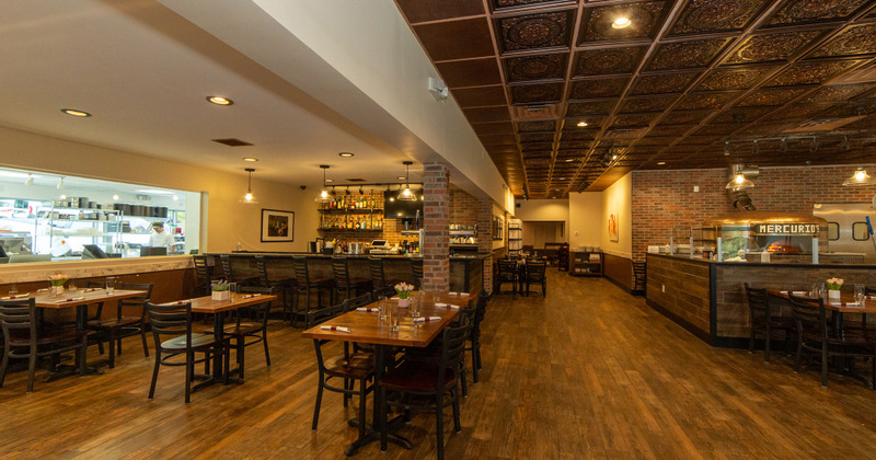 Restaurant interior, tables ready for guests