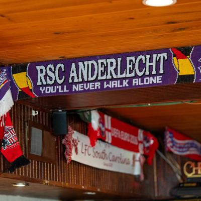 Interior, football scarves on the pub's walls.