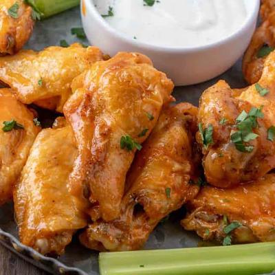 Served wings with dip.