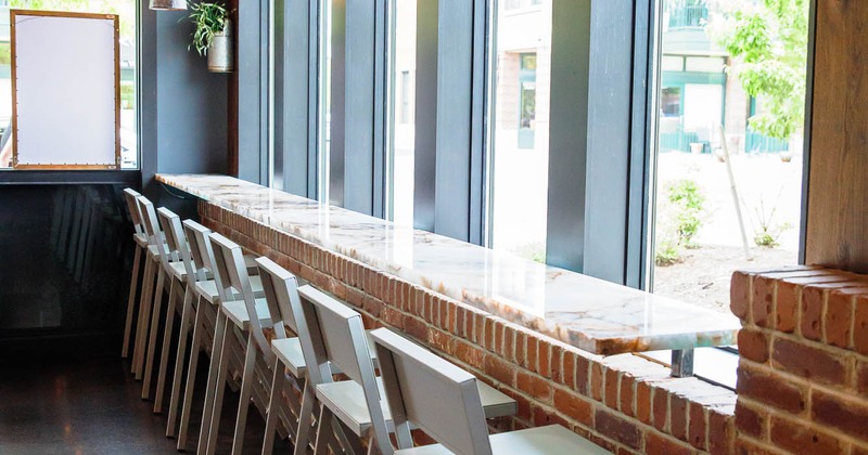 Interior, stools in a row by the window