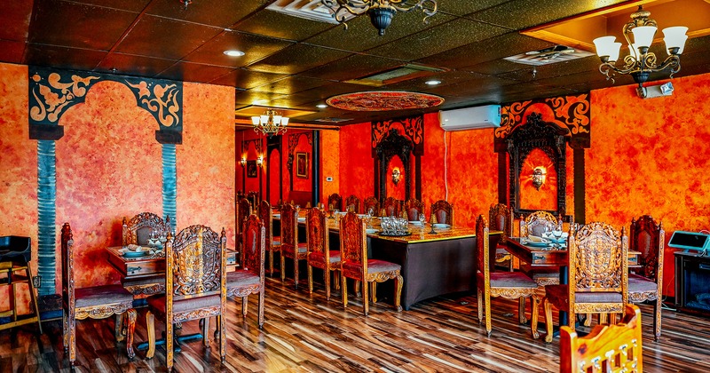 Indian-style design of the dining area with tables