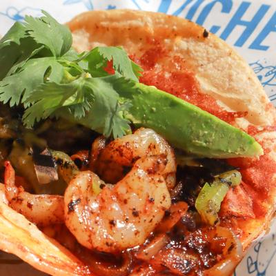 Shrimp avocado taco, close up.