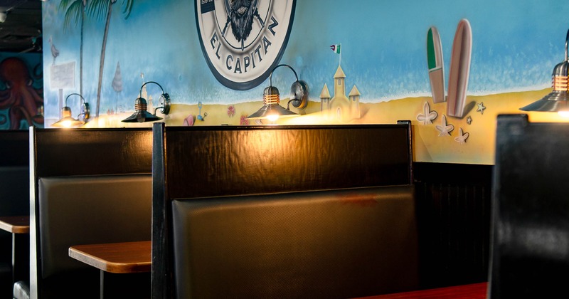 Interior, dining booths, mural on the wall