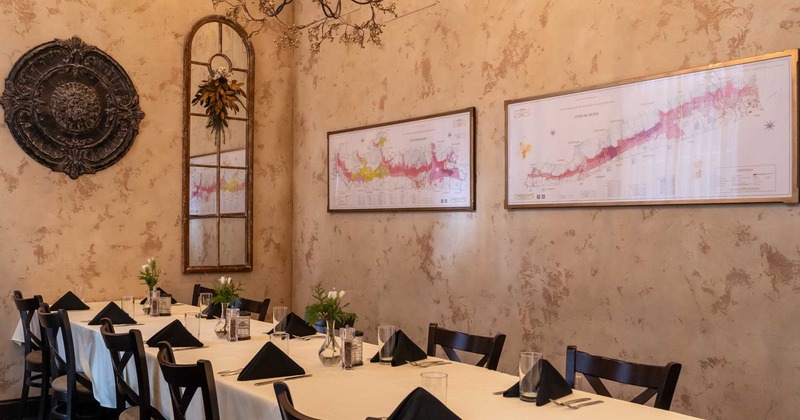 Dining area, wine rack in background
