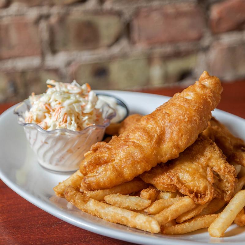 Fish and chips served with coleslaw