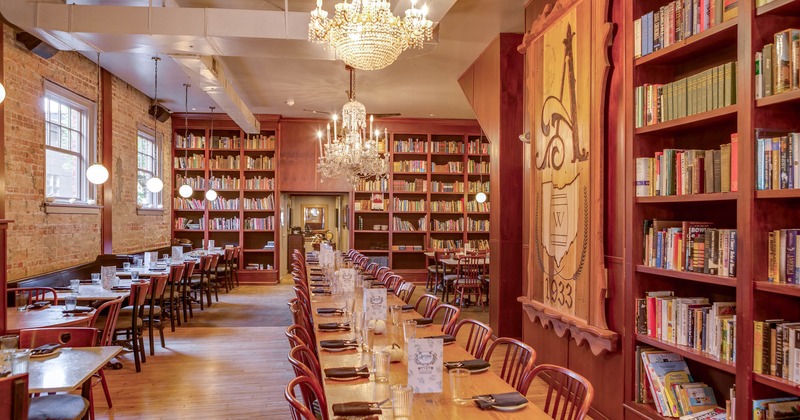 Interior, dining tables, chairs, bookshelf