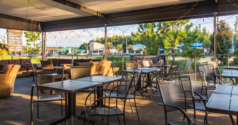Interior, chairs lined up, guests sitting and chatting