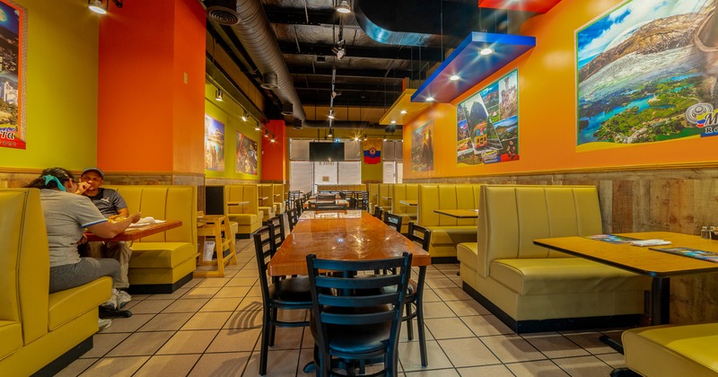 Interior space, dining area, tables, chairs and dining booths