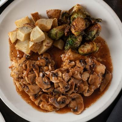 Chicken with mushrooms, top view.