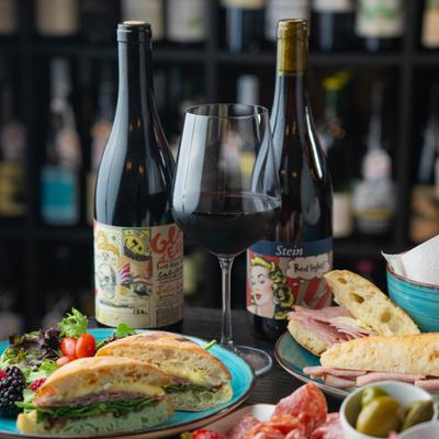 Assortment of dishes with red wine.