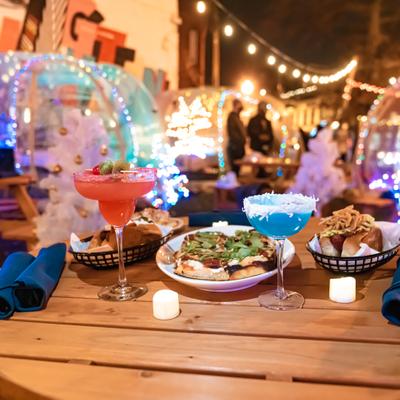 Different types of food and blue cocktail