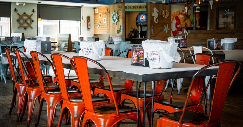 Interior, table with orange chairs