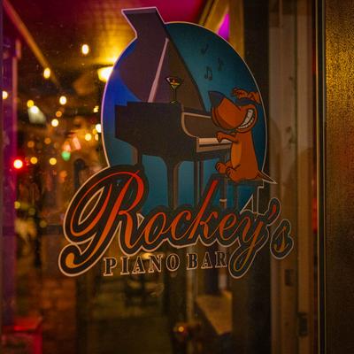 Rockey's Piano Bar exterior detail, window trademark decal.