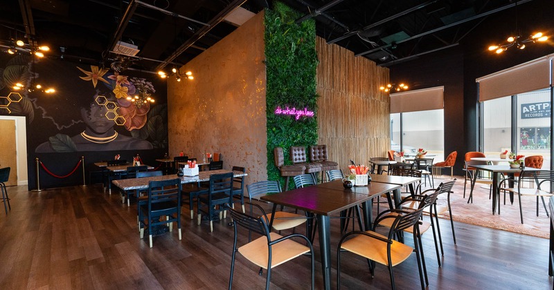 Interior, tables and chairs in seating area