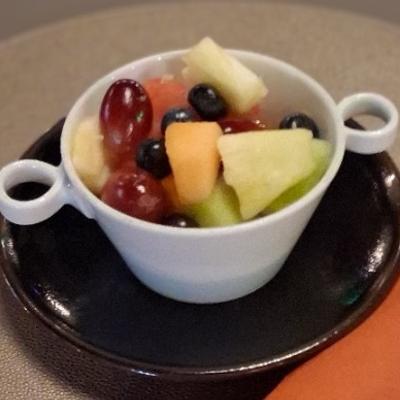 A bowl of mixed fruit.