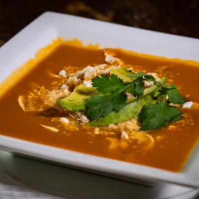 A bowl of tortilla soup.