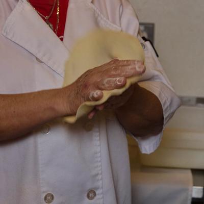 Chef kneading tortilla dough