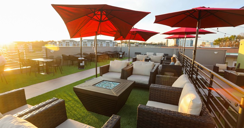 Exterior, seating place on patio with parasols