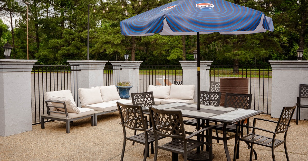 Exterior, white sofas, tables and chairs