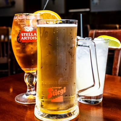 A mug and a glass of beer, and a Margarita cocktail.