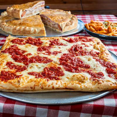 Grandma Pizza, with cheese and tomato sauce.