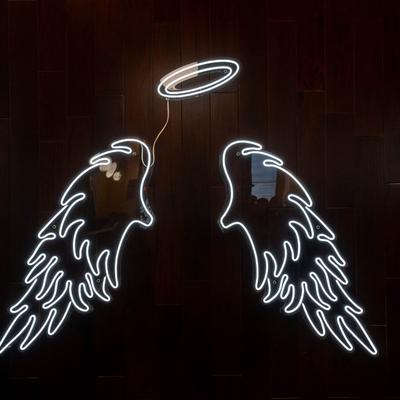Neon lights, angel wings and halo.