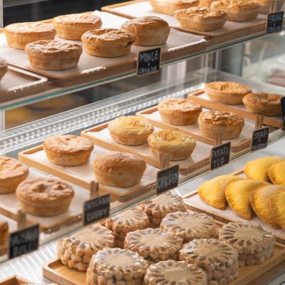 Assorted pastries in a display case.
