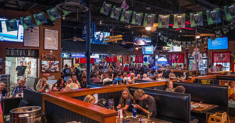 Interior, main dining area full with guests