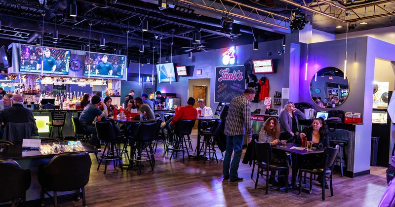 Interior, dining area, bar in the back