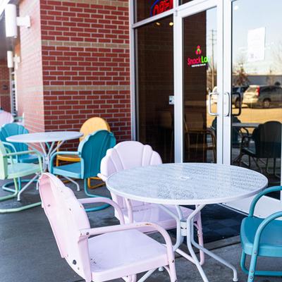 Tables and chairs outside.