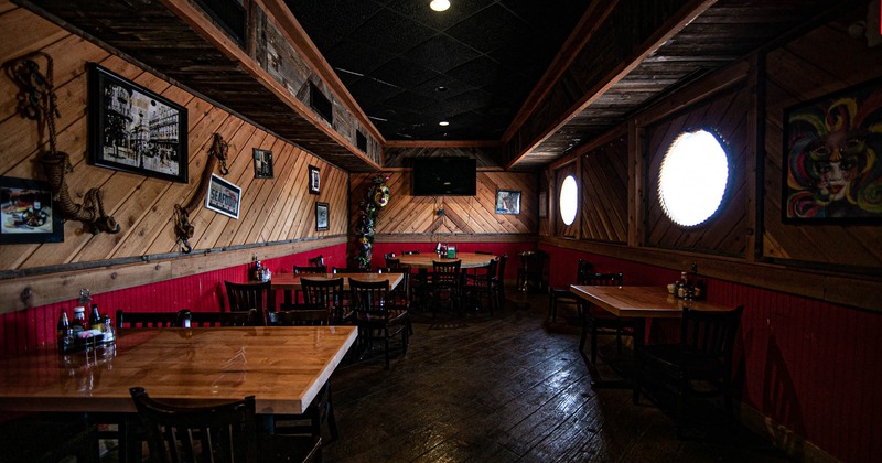 Interior, dining area, framed photos on the walls