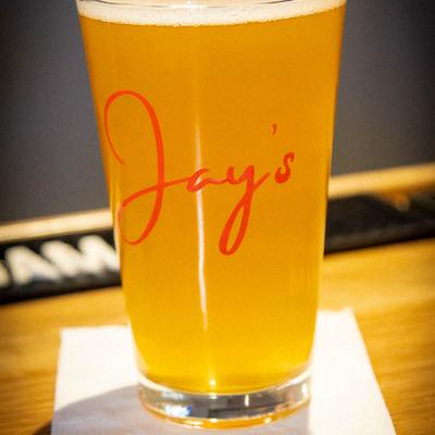 A glass of light beer.