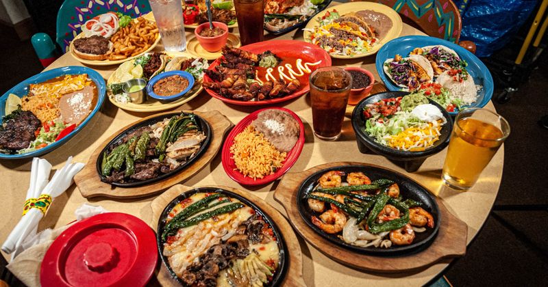 An assortment od dishes and drinks served on a table