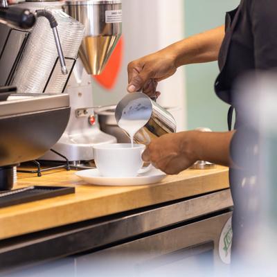 The staff preparing a beverage.