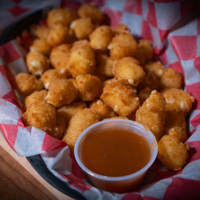 Cheese Curds served with a sauce.