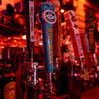 Colorful beer taps.