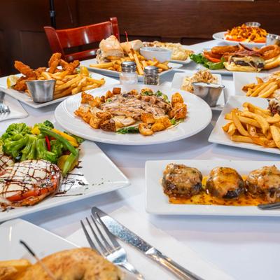 Assorted dishes arranged on a restaurant table