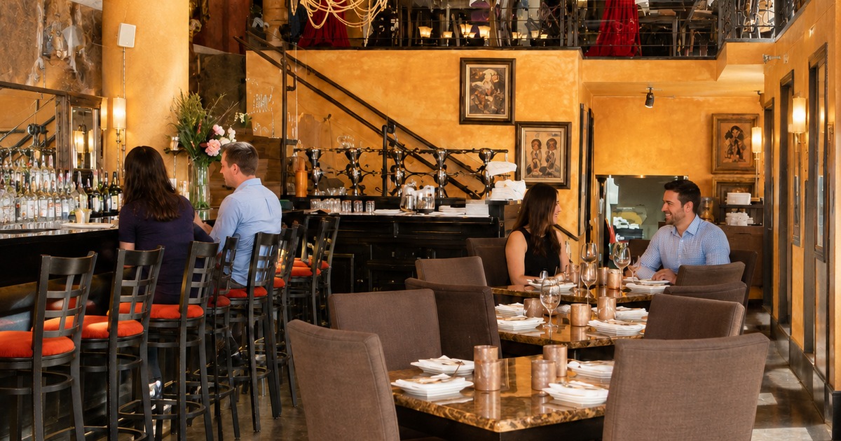 Guests dining together in the main dining room at Il Sogno Italiano in downtown San Diego.