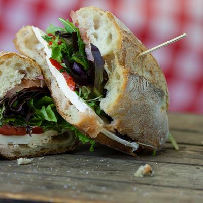 Mozzarella Sandwich with roasted red peppers and fresh greens.