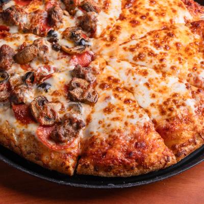 Half Cheese-Half italian garlic combo pizza, close-up.