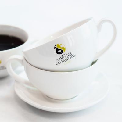 Coffee cups with the company logo.
