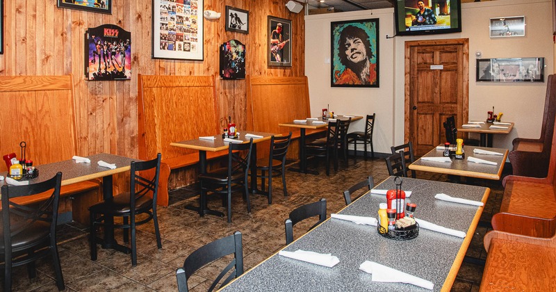 Interior, tables set for guests in dining area