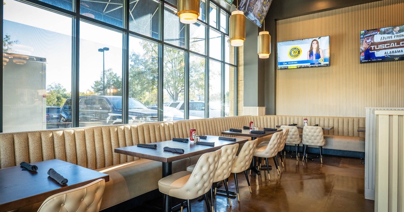 Interior, banquette seating, tables and chairs