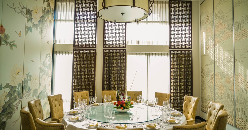 Round table set for thirteen people