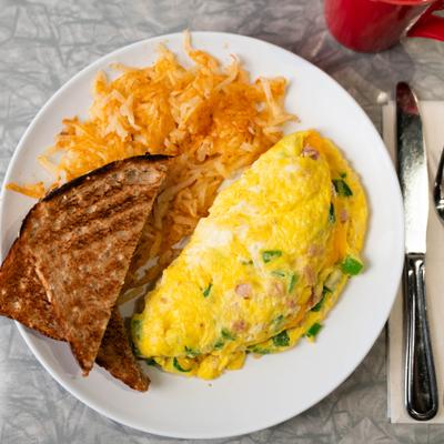 The western omelet with whole wheat toast.