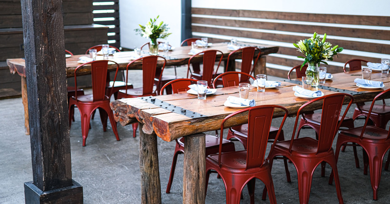 Patio tables ready for guests