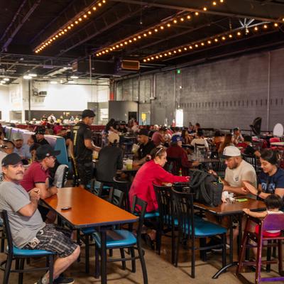 Customers sitting at the tables.