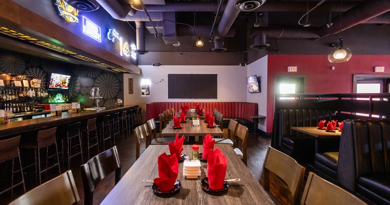 Interior, dining area with tables set for guests