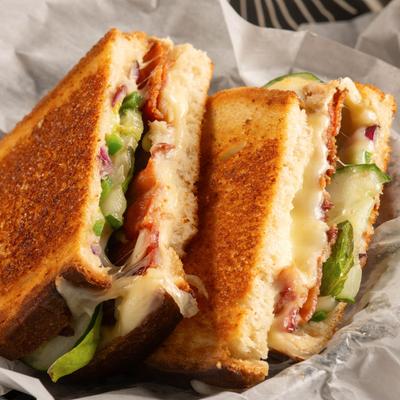 The Endeavor grilled cheese sandwich with bacon, cucumbers, and jalapenos.