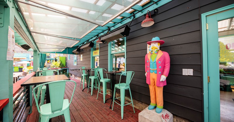 Exterior, covered patio, tables and chairs